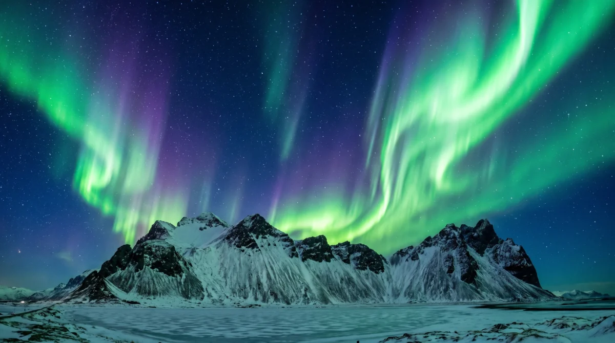 Generated example: northern lights over a mountain ridge